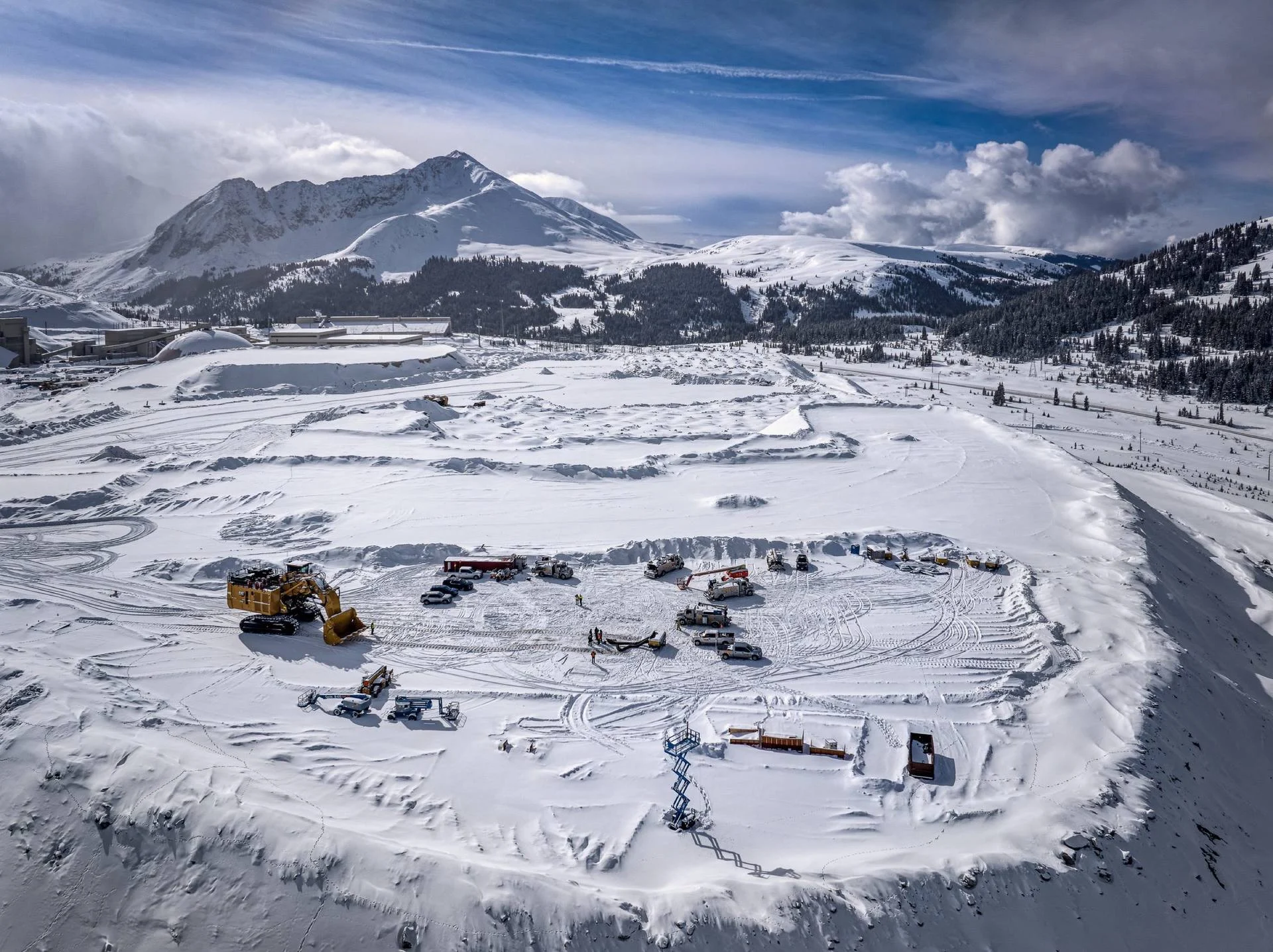 An aerial view of a winter mining operation