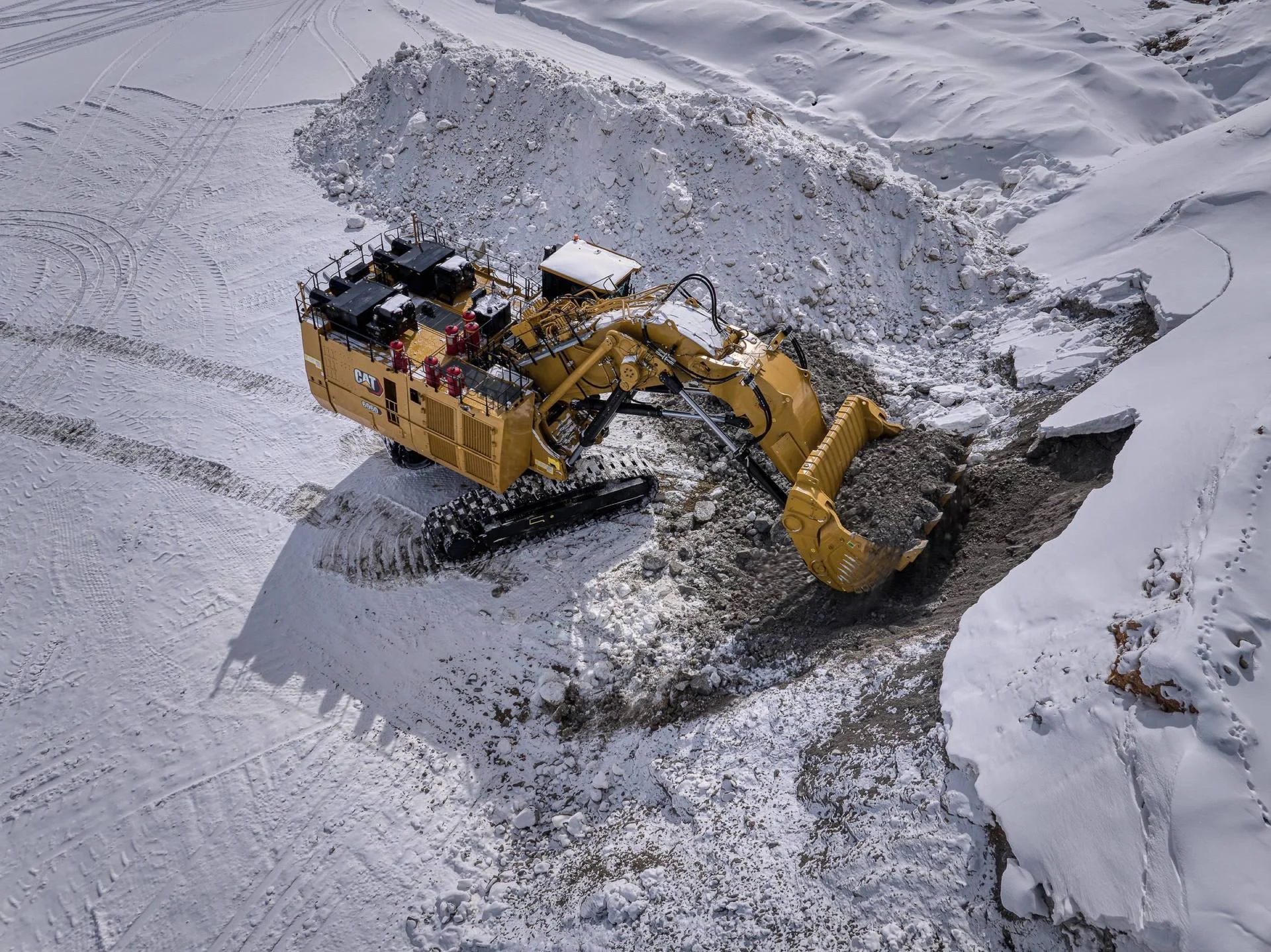 A Cat mining shovel loading in winter conditions